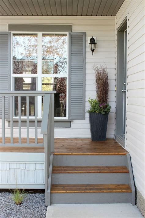 Read all about curb appeal and my recent outdoor lighting update. Front Porch Reveal + New Door Color | Front porch makeover ...