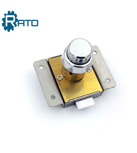 Then, hold the paperclip vertically and insert after you've turned the keyhole to the unlocked position, remove the paperclip and slide open your cabinet drawer. High Quality File Cabinet Safety Press Rim Wooden Drawer Lock