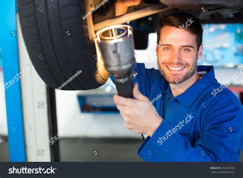 Mechanic Using Torch Look Under Car Stock Photo 252245749 Shutterstock