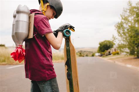 Boy With Jetpack And Skateboard Stock Photo 167479 Youworkforthem