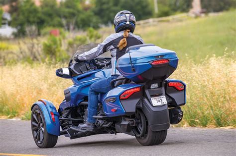 The vehicle has a single rear drive wheel and two wheels in front for steering, similar in layout to a modern snowmobile. 2018 Can-Am Spyder F3 Limited - Review