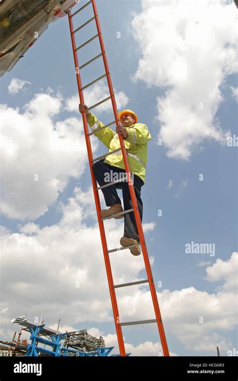 Worker Climbing Ladder