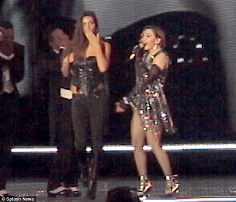 madonna pulls down a female fan s top and exposes her bare breast in brisbane daily mail online
