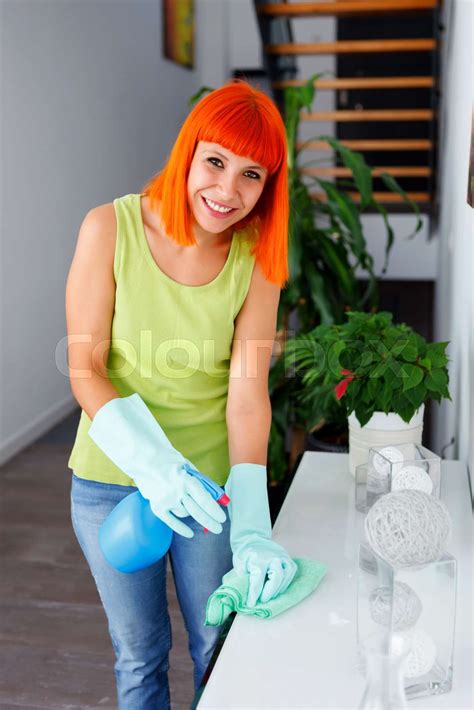 Red Hair Housewife Cleaning Her Home Stock Image Colourbox