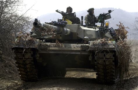 A Republic Of Korea Rok K1a1 Main Battle Tank Mbt Maneuvers On A