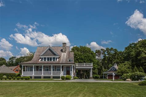 Classic Cape Cod Style House Exterior With Front Porch