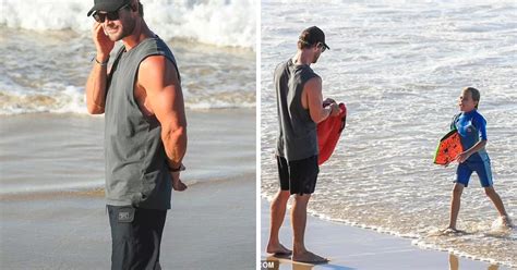 Lifeguard Thor So Strong Chris Hemsworth Shows Off His Bulging Biceps
