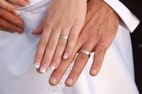 Bride And Groom Showing Wedding Rings Stock Photo Jankratochvila