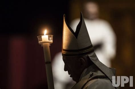 Photo Pope Francis Holds A Candle As He Presides Over Holy Saturday Vatx2020041102