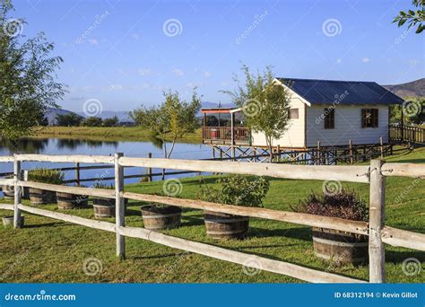 House On Scenic Lake Stock Photo Image Of Landscape 68312194