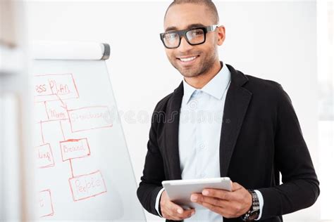 Happy Young Businessman Using Pc Tablet In Office Stock Photo Image