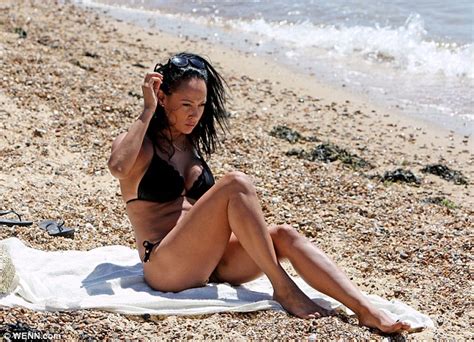So Solid Crews Lisa Maffia Enjoys Uk Heatwave In Plunging Black Bikini
