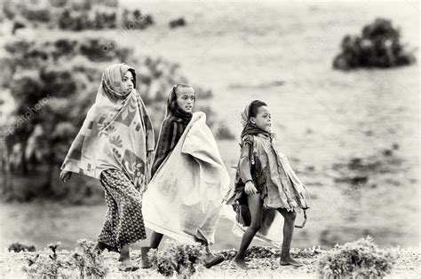 Three Ethiopian Girls Walk Around Stock Editorial Photo