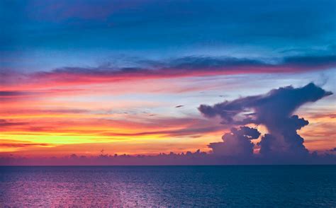 Colorful Sunset And Cloud Formation Over The Ocean Photograph By Yevgen