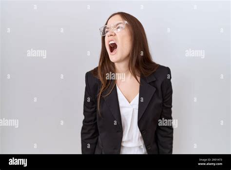 Beautiful Brunette Woman Wearing Business Jacket And Glasses Angry And