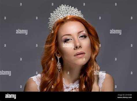 Beauty Queen Woman With Crown On Head In Lace Dress Posing With