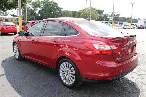 Pre Owned 2012 Ford Focus Titanium Sedan 4 Dr In Tampa 1981 Car