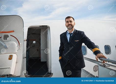Handsome Pilot Standing On Airstairs To Plane Stock Image Image Of
