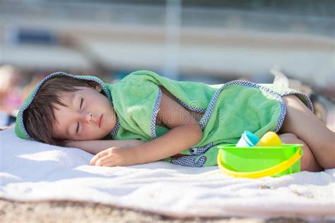 226 Little Boy Laying Beach Stock Photos Free And Royalty Free Stock
