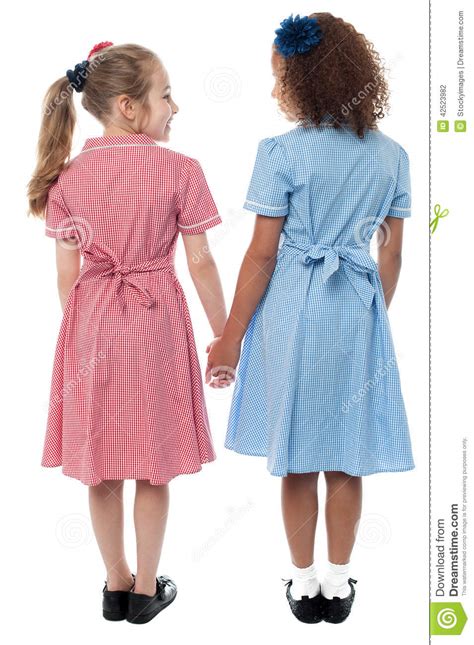 Back View Of Girls In School Uniform Stock Photo Image