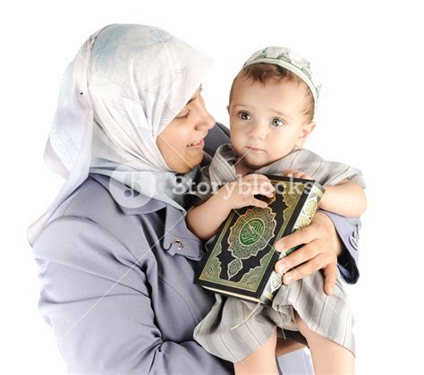 Muslim Mother And Her Little Son Holding A Koran Royalty Free Stock Image Storyblocks