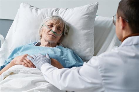 Doctor Caring About The Senior Patient Stock Photo Image Of Nurse