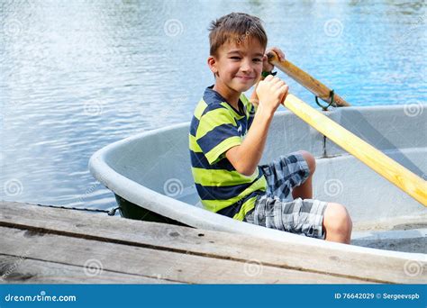 Portrait Of A Boy In A Boat Stock Image Image Of Leisure Coast 76642029