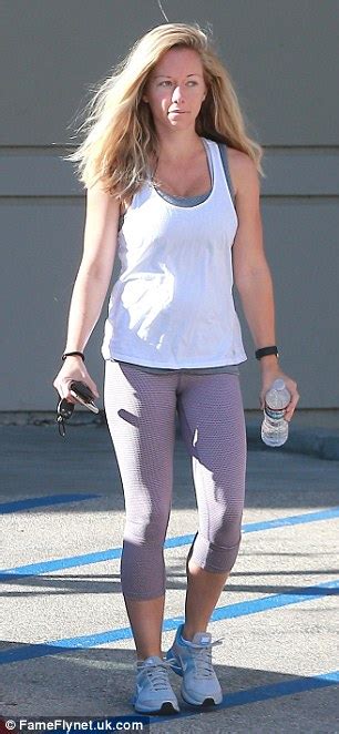 Kendra Wilkinson Sports White Vest Top And Sheer Leggings As She Works