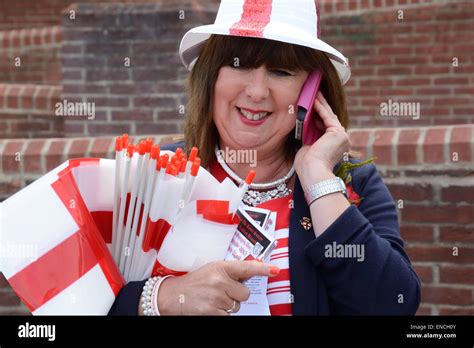 Lady With Flags At St Georges Day Parade Nottingham England Stock