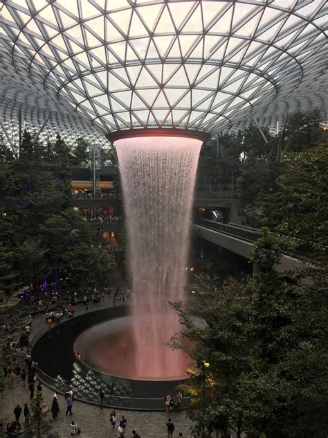 At night, the waterfall becomes. Indoor waterfall at Jewel Changi Airport. : mildlyinteresting