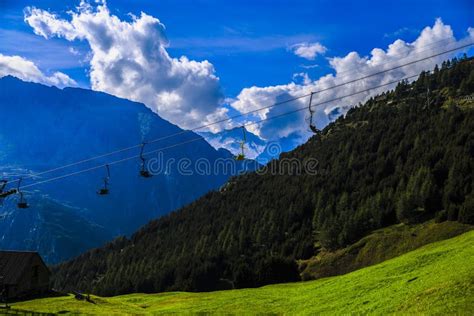 Idyllic Summer Landscape In The Alps With Fresh Green Stock Photo