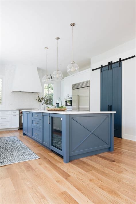 Maybe you would like to learn more about one of these? The kitchen island and pantry barn door are painted in ...