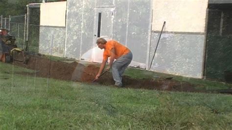 The trench should have a consistent slope from beginning to end. Do It Yourself - YARD DRAIN - YouTube