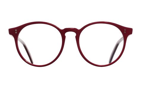 A Quirky Cutler And Gross Round Optical Frame Featuring A Keyhole
