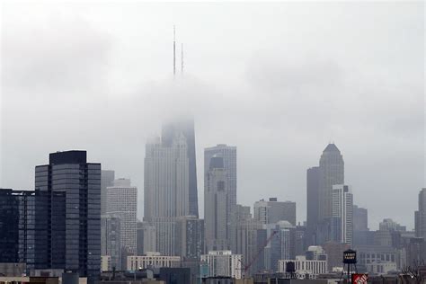 Dense Foggy Weather Turns Chicago Into A Dreamy Floating Cityscape