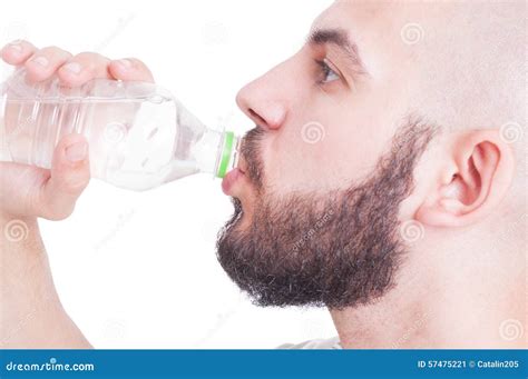Close Up With Guy Drinking Water From Plastic Bottle Stock Image