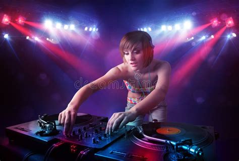 Dj Girl Playing Songs In A Disco With Light Show Stock Photo Image Of