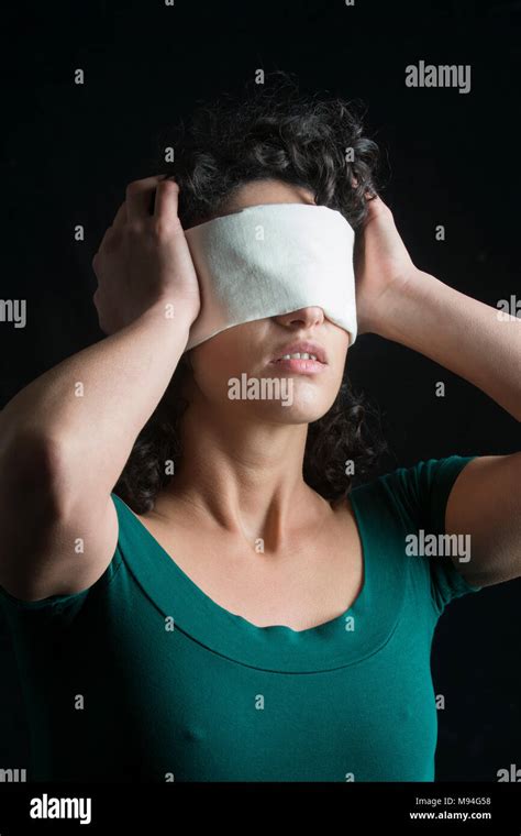 Portrait Of A Blindfolded Woman With Dark Hair Stock Photo Alamy