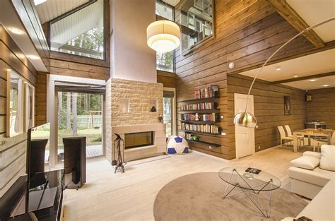 The timeless allure of wood, metal and neutral colours helps to bring a robust air to interior design. Design d'interieur d'une maison en bois moderne du style ...