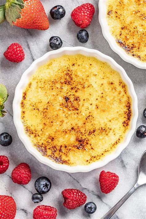 A silky, smooth vanilla custard topped with a layer of brittle caramel, that is easier to make at home than you think. Easy Classic Crème Brûlée | Recipe in 2020 | Delicious cheesecake recipes, Yummy food dessert ...