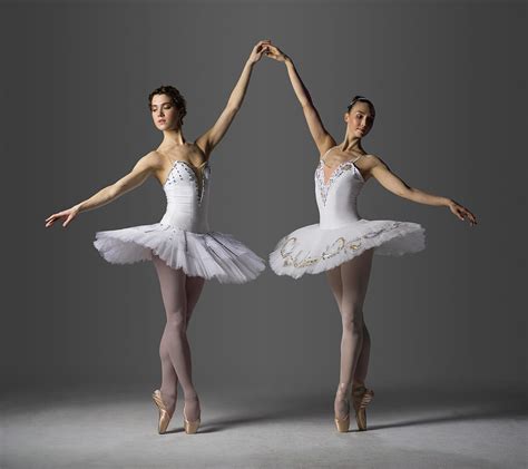 Two Ballerinas Performing Relevé On Photograph By Nisian Hughes Fine