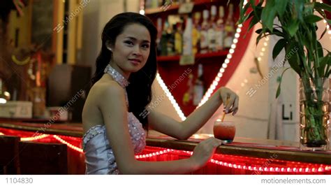 Gorgeous Asian Woman Alone At Bar Stock Video Footage 1104830
