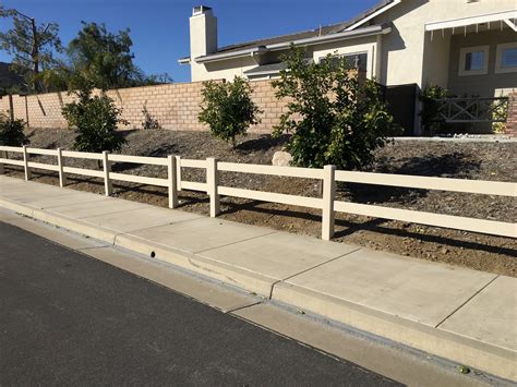 Our fences and rail products affordably enhance any property, which will not only raise your property value, but can increase the beauty of the architecture. two rail vinyl fence/ tan ranch rail vinyl | Vinyl fence ...