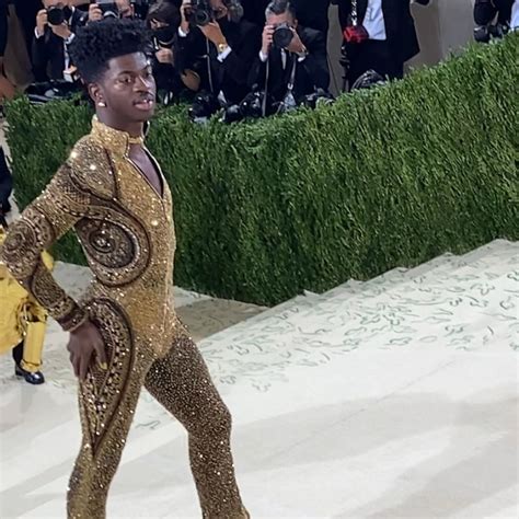 Watch Lil Nas X Transform Into His Gold Bodysuit At The Met Gala Good