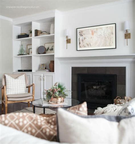 Living room with fireplace and tv on opposite walls. How to Hang A TV Over A Fireplace | Living room decor ...