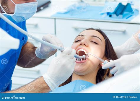 Cute Young Woman At The Dentist Mouth Checkup Royalty Free Stock Image