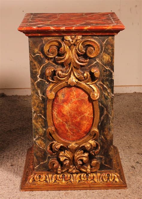 Pair Of Pedestals In Gilt Wood And Faux Marble Décor From Spain 17th