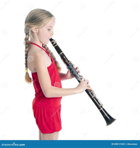 Young Blond Girl In Red Playing Clarinet Stock Photo Image Of
