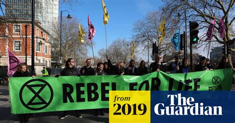 Climate Protesters Disrupt London Fashion Week By Blocking Roads