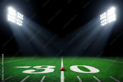 Football Field At Night With Stadium Lights Stock Photo Adobe Stock